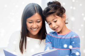 Mother and daughter reading during winter