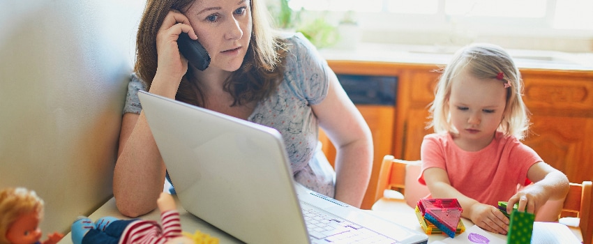 Parent trying to work while caring for child at home